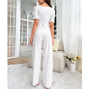 Women's floral pajama set with short sleeves and long pants in white flower print