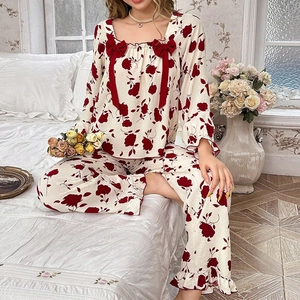 Floral pajama set with square neck, bow detail and ruffle trim in creamy white and red