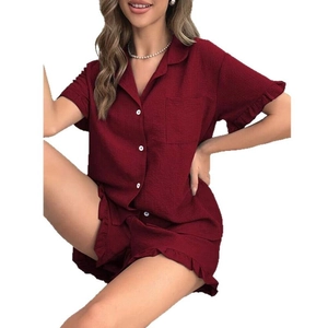 Women's burgundy short sleeve pajama set with ruffle trim and button-down collar top