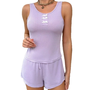 Women's summer two-piece lavender knit pajamas set with ribbed texture and decorative bows