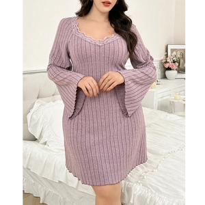 Detail of V-neck lace trim and ribbed knit texture on mauve long-sleeved loungewear dress