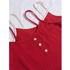 Women's red ribbed camisole pajama top with cherry print straps and white buttons