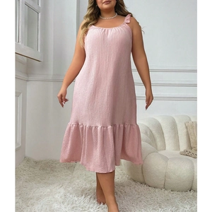 Plus size light pink sleeveless nightgown dress with ruffled hem and pleated texture