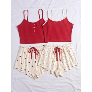 Women's summer pajama set with red rib-knit camisole and heart print shorts