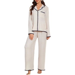 Women waffle knit pajama set featuring contrast wavy trim and button-down long sleeves