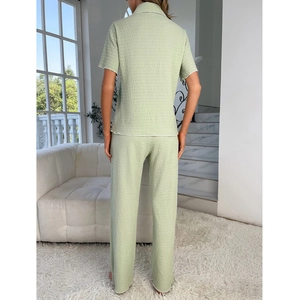 Women's light green short sleeve loungewear set with notched collar and long pants