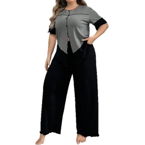 Ensemble de détente grande taille pour femme avec haut bicolore et pantalon noir ample