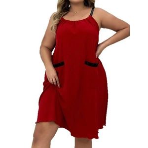 Deep red loose plus size strap dress with ribbed fabric and black pocket details