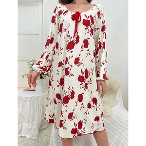 Floral print long sleeve nightgown with a red bow tie and white ruffled fabric