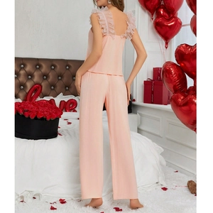 Pink two-piece pajamas set with lace straps and wide-leg pants for women homewear