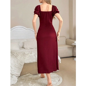 Slim fit wine red midi dress with puff sleeves and backless design in indoor setting