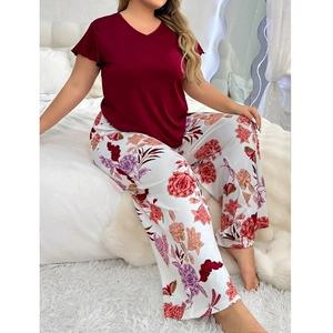 Plus size pajama set with V-neck short sleeve top and floral print wide leg lounge pants
