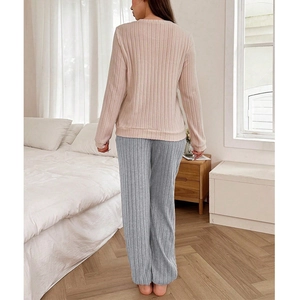 Women's heart-themed ribbed knit pajamas set with pink long sleeve top and grey pants