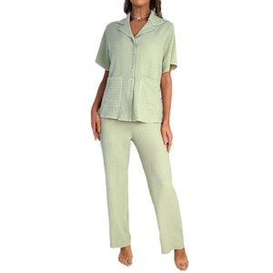 Women's light green short sleeve pajama set with lapel collar and textured long pants