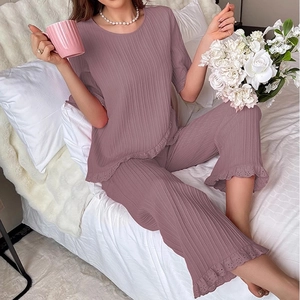 Short sleeve purple pajama set with lace edges and pleated fabric for comfortable home wear
