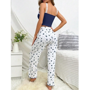 Women floral pajama set with blue lace camisole and white floral print trousers