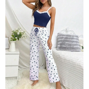Floral camisole pajama set with lace trim and blue print trousers for summer wear