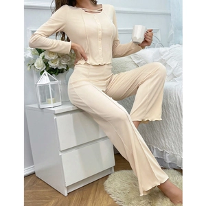 Women's cream ribbed pajama set with long sleeves and wide-leg pants for home comfort