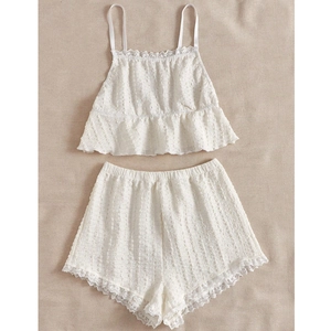 Sexy white lace camisole and shorts pajamas set for women with ruffle details