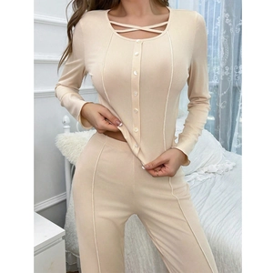 Women's ribbed lounge set with long-sleeved button-up top and high-waisted pants