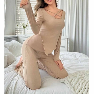 Women's rib-knit two-piece pajama set with V-neck cross-strap top and lettuce hem pants