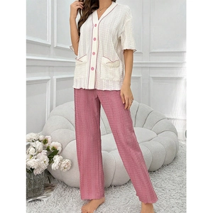 Women's V-neck short sleeve pajama set with pink contrast trim and pleated texture
