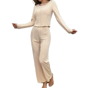 Beige ribbed knit loungewear set with V-neck long sleeve cardigan and wide leg pants