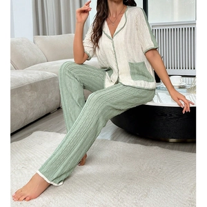 Short sleeve pajamas set with button-up shirt and long pants in Sage Green and Cream