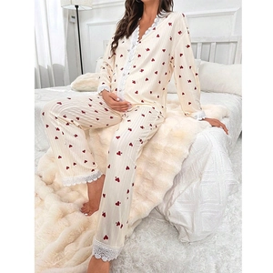 Women's cream maternity pajama set with red heart print and delicate lace trim