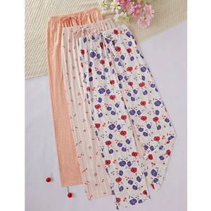 Flat lay of women floral pajama pants with elastic waist and various print patterns