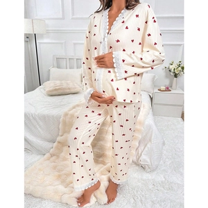 Cream maternity pajamas set with red heart print, long sleeves and lace trim detail