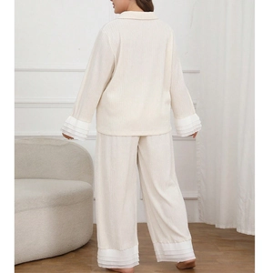 Women's cream white long sleeve lounge set with elegant ruffled edges and pleated fabric