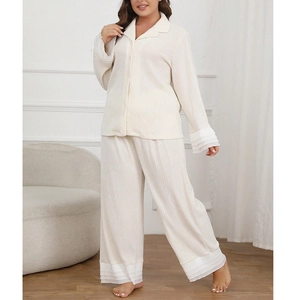 Women's cream white plissé pajama set with ruffle trim and long wide-leg trousers