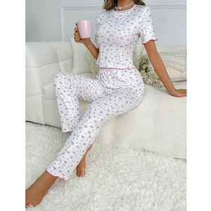 Floral rib-knit pajamas set for women featuring white short sleeve top and long pants