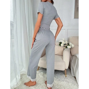 Women's grey two-piece pajama set with ruffled sleeves and lace trim pants for home comfort