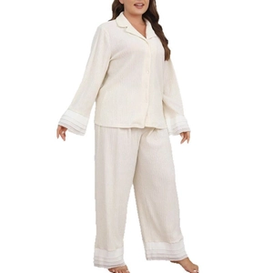 Women's cream plisse pajama set with button-down long sleeve shirt and loose trousers