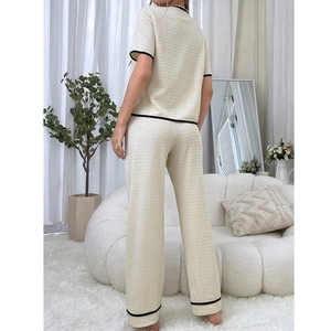 Women's V-neck textured loungewear set with cartoon bear and black contrast piping