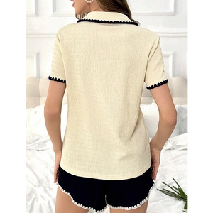 Women's two-piece pajama set with lapel short-sleeved top and wavy-edged shorts