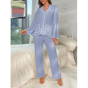 Detail of pleated fabric texture and white contrast piping on women pajama set