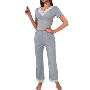 Two-piece gray V-neck pajama set with short sleeves and white lace trim for women
