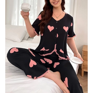 Women's two-piece heart print pajamas set with short sleeve button-down top and long pants
