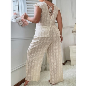 Elegant off-white lace pajama set with V-back top and wide-leg trousers for women