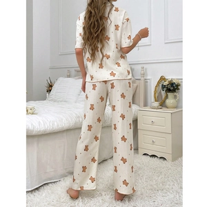 Women's pajama set featuring short sleeves and pants with cute cartoon bear print