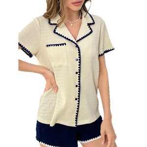 Chic beige short sleeve lapel pajama set with navy shorts and wavy trim details