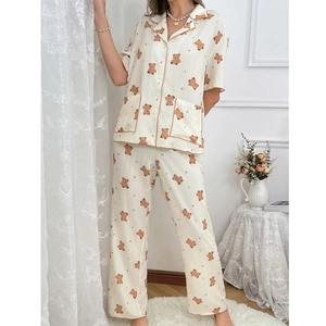 Women's two-piece cotton pajama set with short-sleeved top and pants in cute bear print
