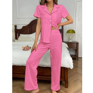 Pink heart print pajama set featuring short sleeve button top and matching pants