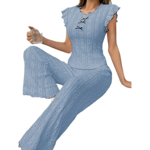 Light blue knit loungewear set with floral hollow pattern and bow tie round neck