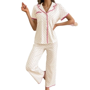 Women's heart print pajama set with short sleeve lapel top and long pants in cream