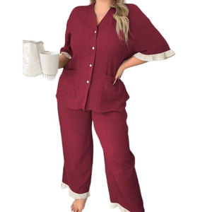 Burgundy v-neck short sleeve pajama set with ruffle trim and wide-leg trousers