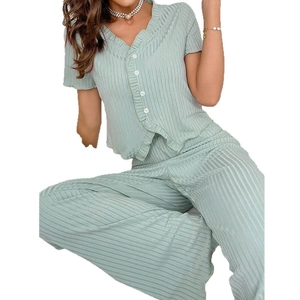 Mint green knit pajama set for women featuring short-sleeved V-neck top and wide-leg trousers